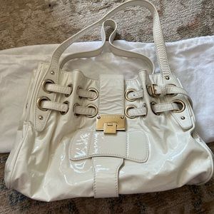 Authentic Jimmy Choo white and gold shoulder bag.